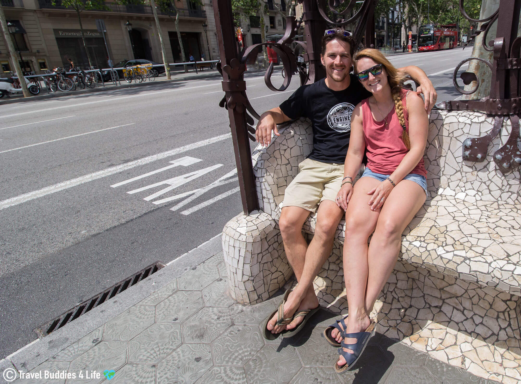 Joey and Ali Sitting in one of the Mosaic Bus Chairs in Barcelona, Spain