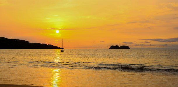 A Sail Boat and Sunset from Playa Hermosa, Costa Rica